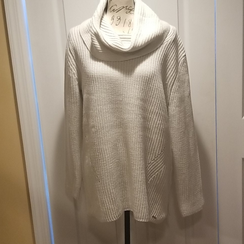 New DKNY ivory sweater ..size large